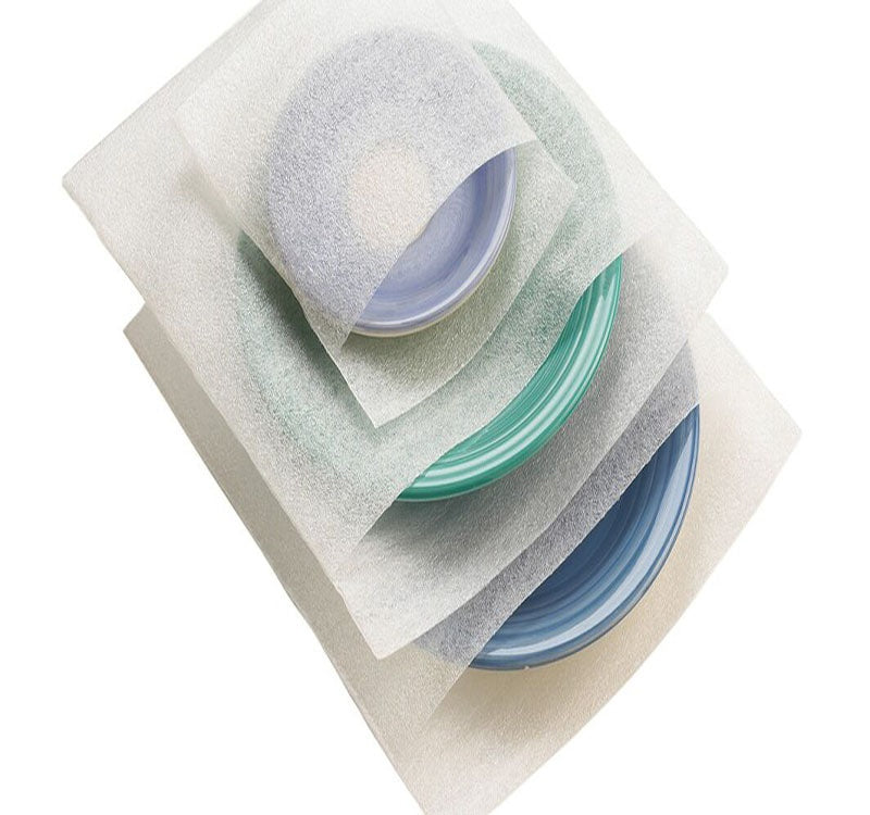 A 24 piece variety pack of white foam pouches containing three sizes for packing dinner plates, salad plates, and cups.